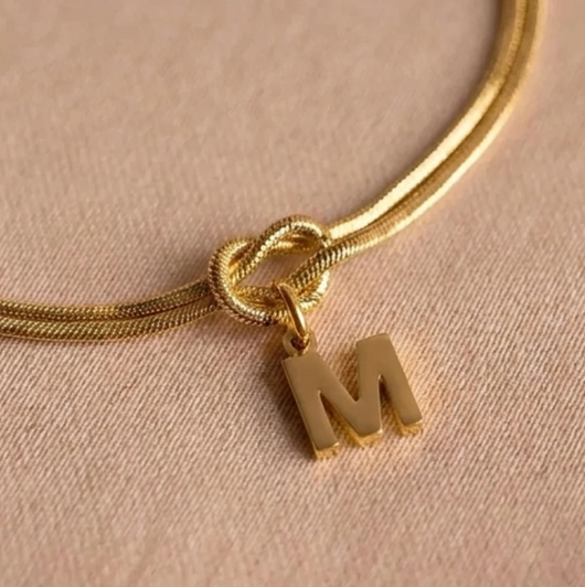 Forever Knot med berlock